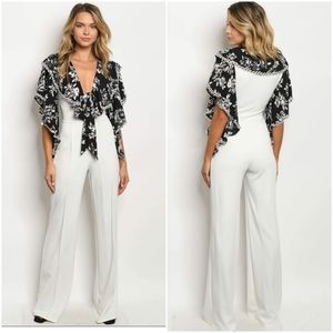 Ivory jumpsuit with black floral collar